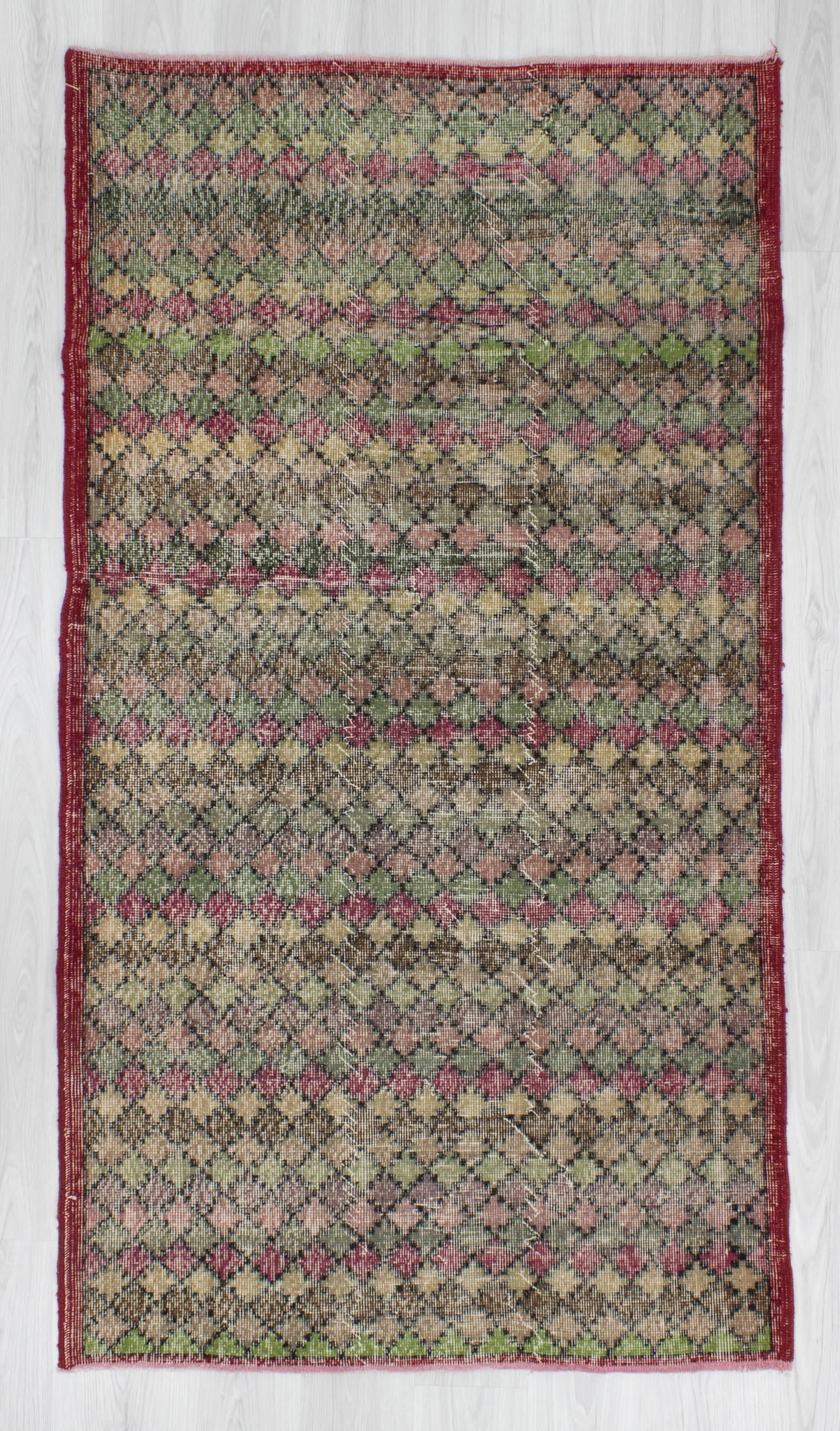 Vintage hand-knotted decorative Turkish art deco rug