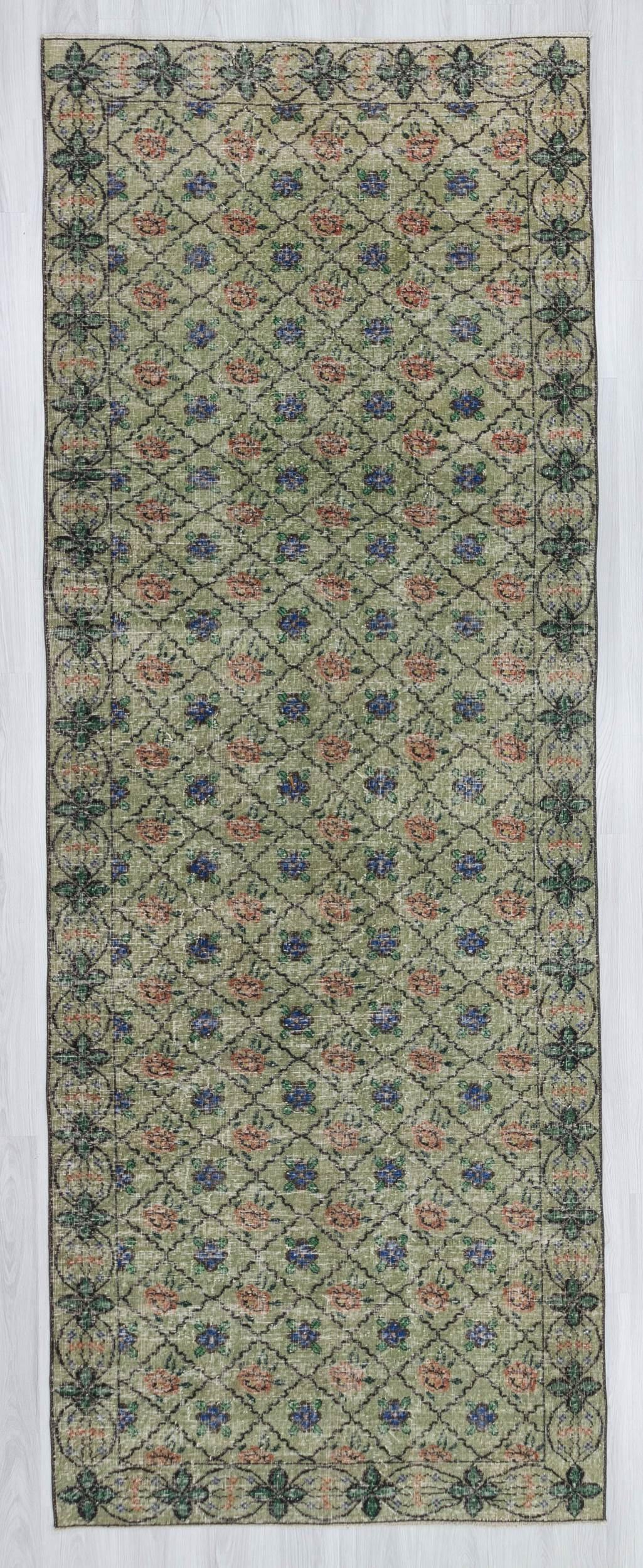 Vintage handknotted decorative soft green Turkish area rug