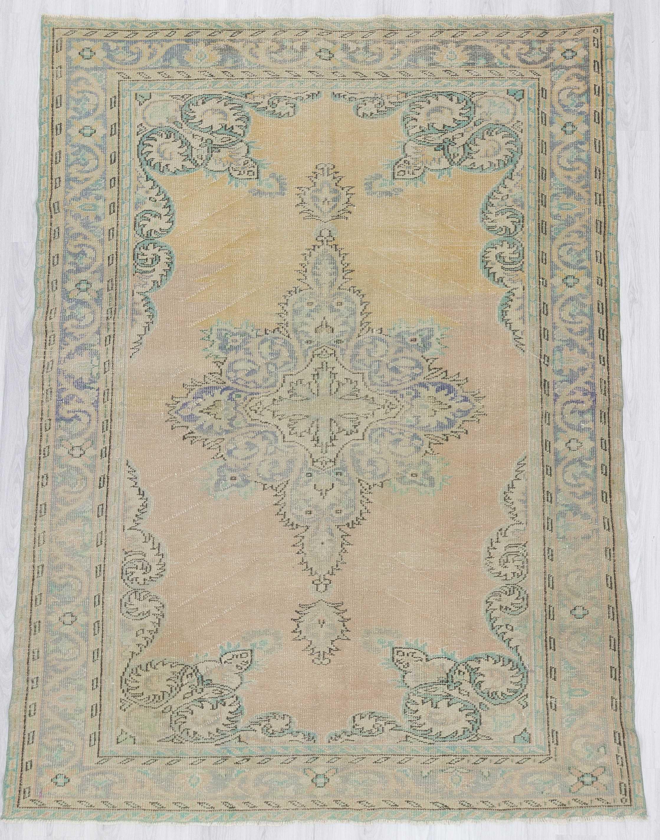Washed out vintage Turkish Oushak rug
