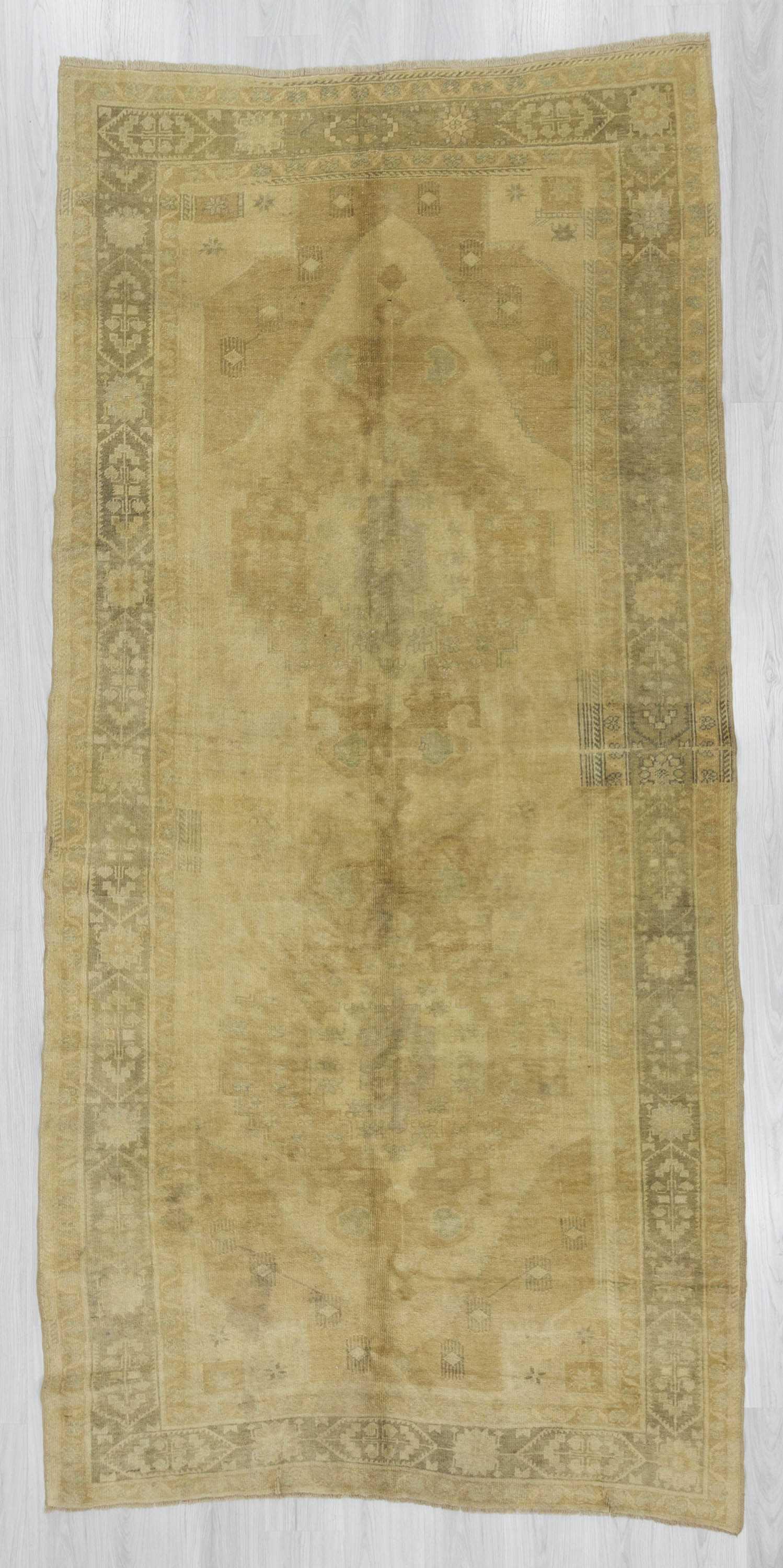 Washed out vintage Turkish rug
