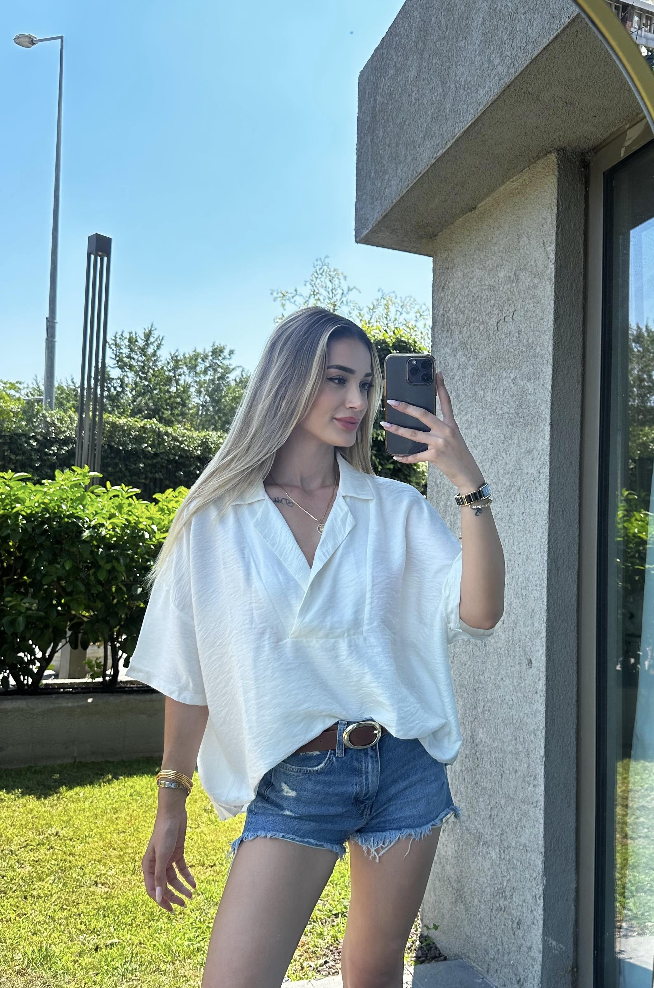 Kadın önü kısa arkası uzun v yaka bluz