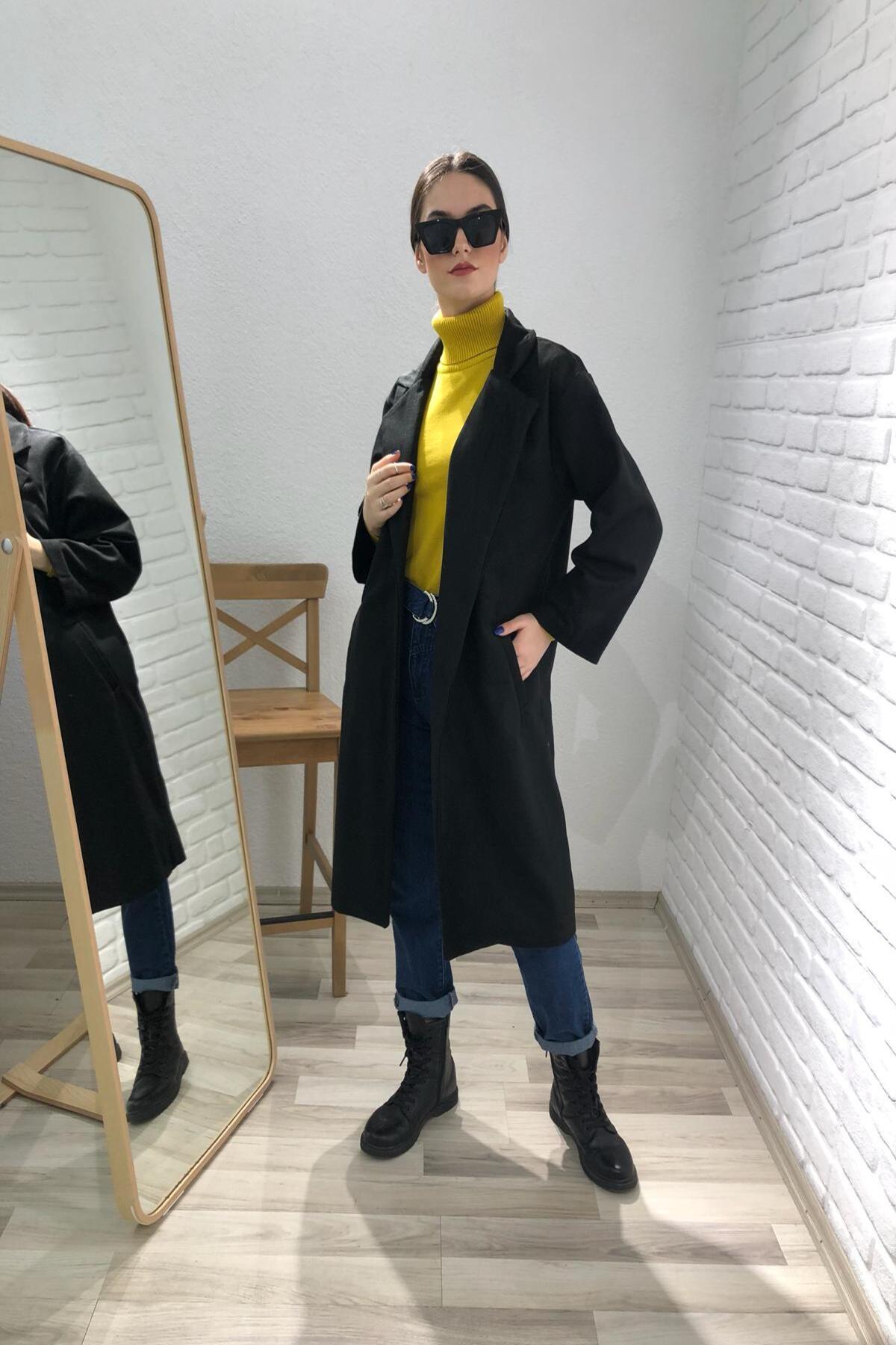 معطف أسود برقبة على شكل حرف V للبيع بالجملة