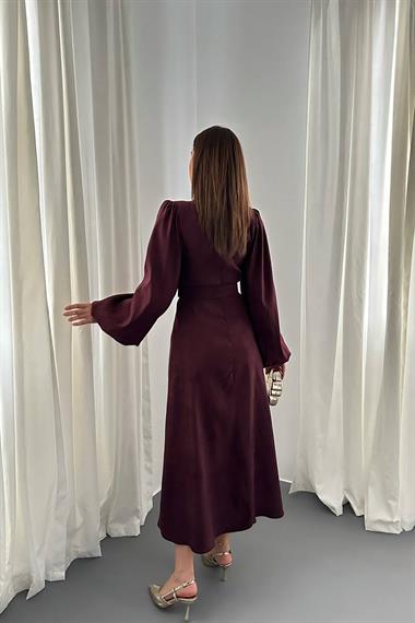 Wholesale Plum-colored dress with buckle detail and belt.