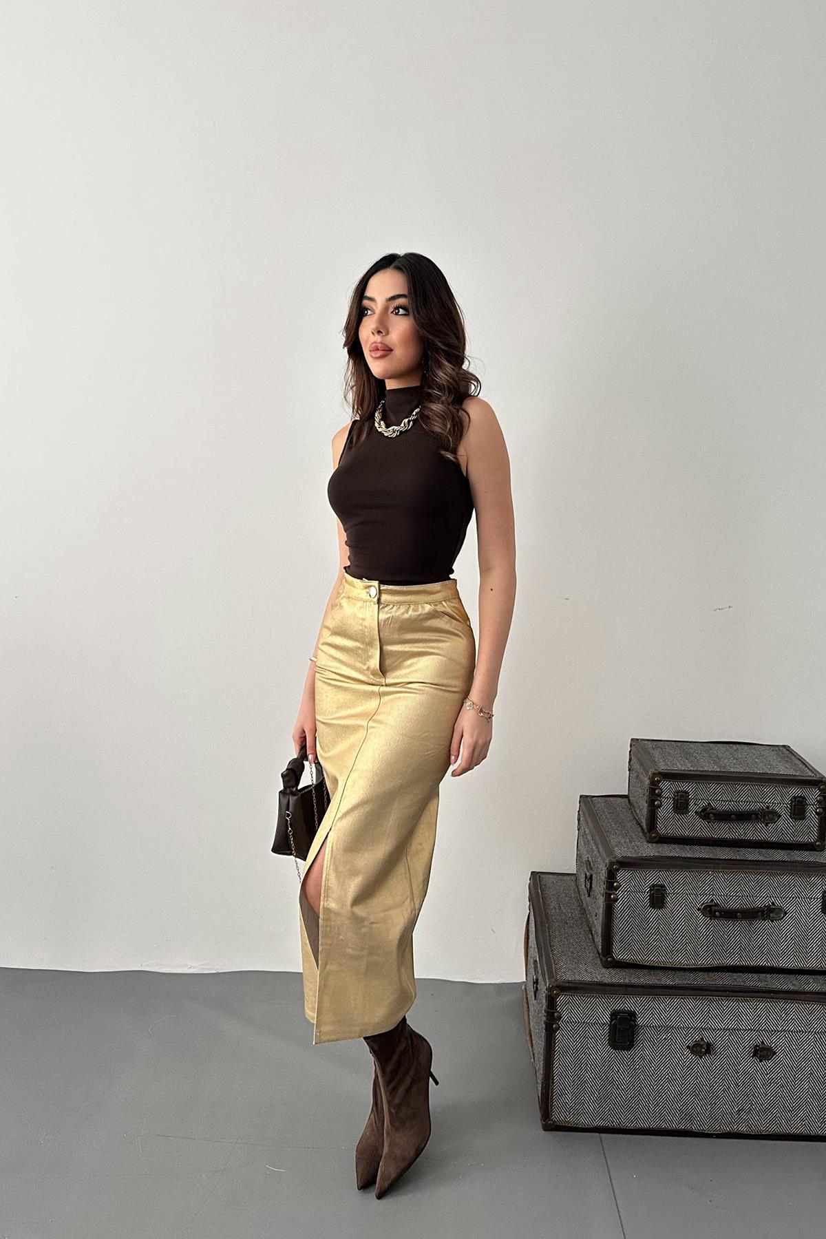 Оптовая продажа юбки из габардина с золотым листом