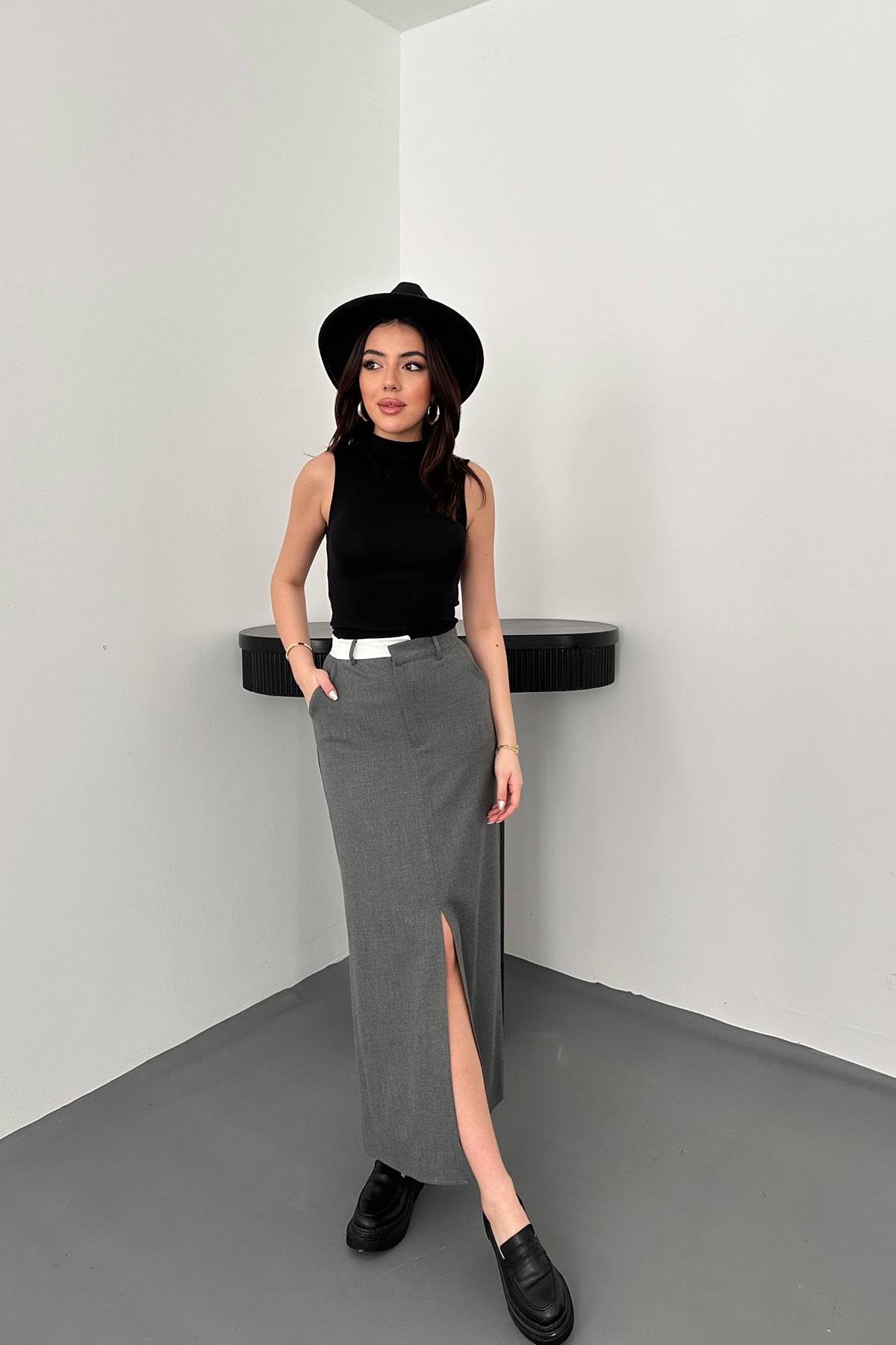 Оптовая продажа серая клетчатая юбка из поливискона с отделкой