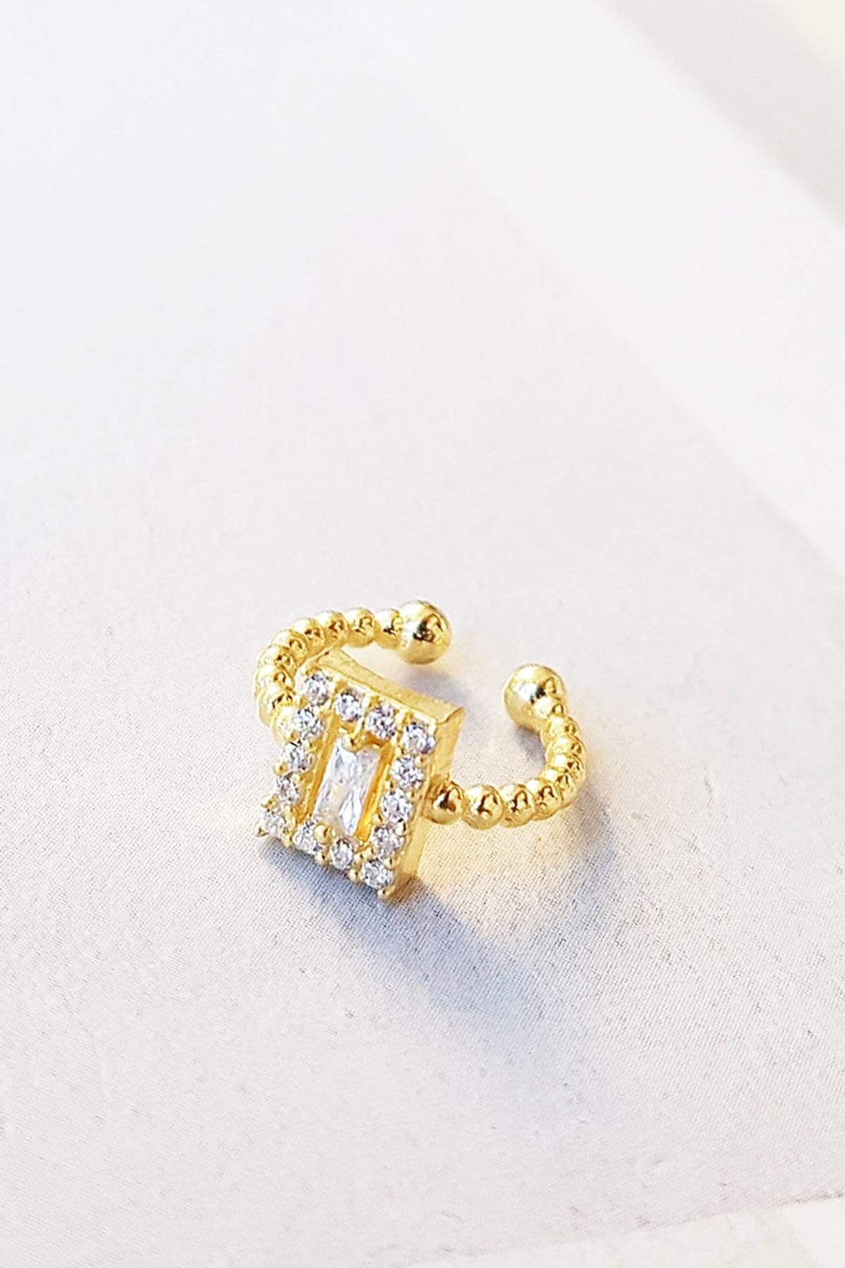 BAGUETTE DESIGN GOLD PLATED SILVER BEAD WITH SURROUNDING STONES