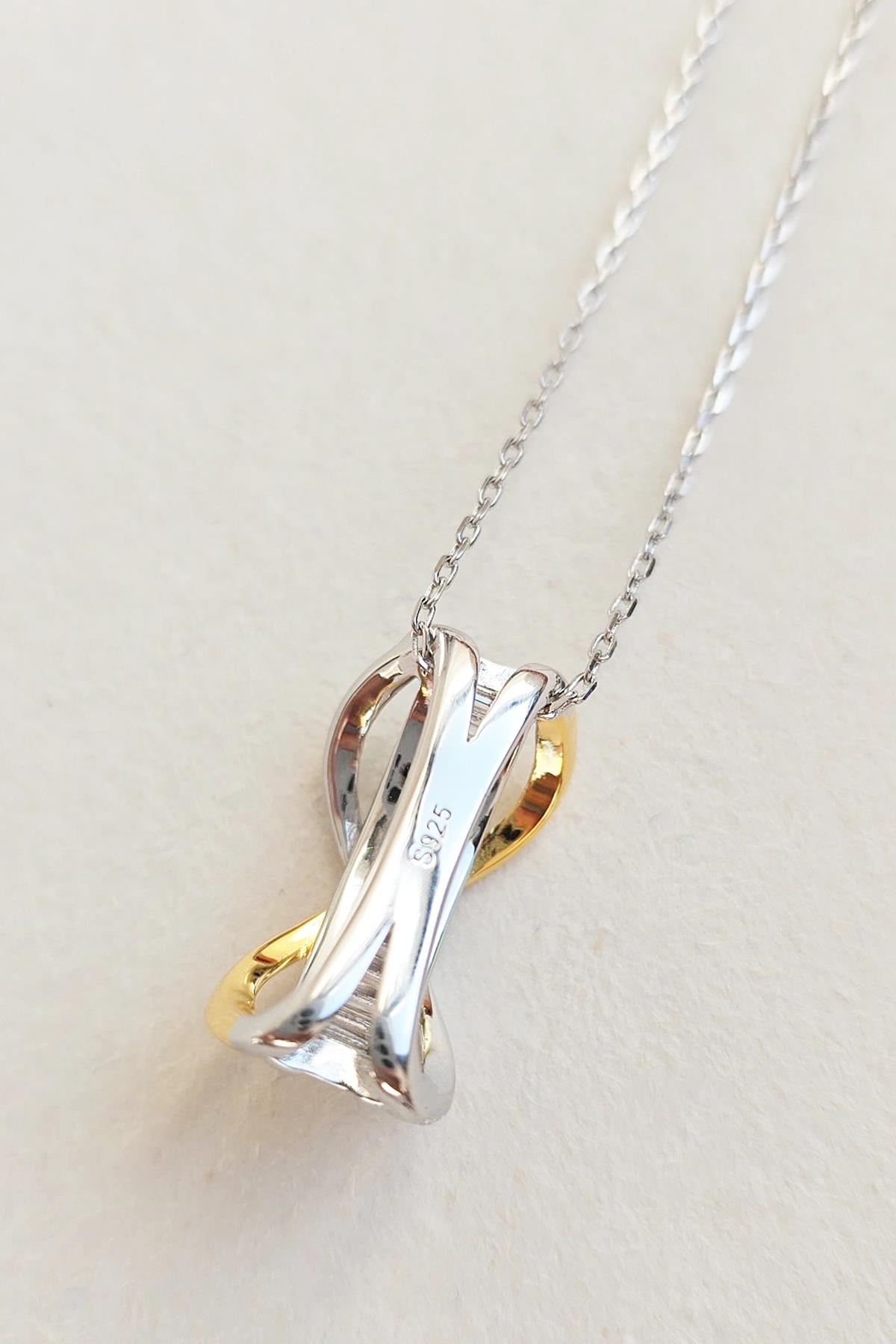 İTHAL ÇAPRAZ X BAGET GÜMÜŞ KOLYE