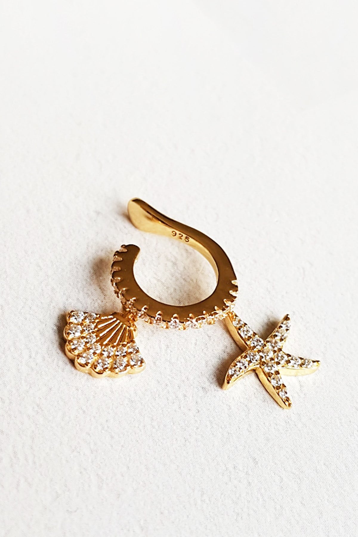 IMPORTED SEA STAR STONES SILVER CHIRP