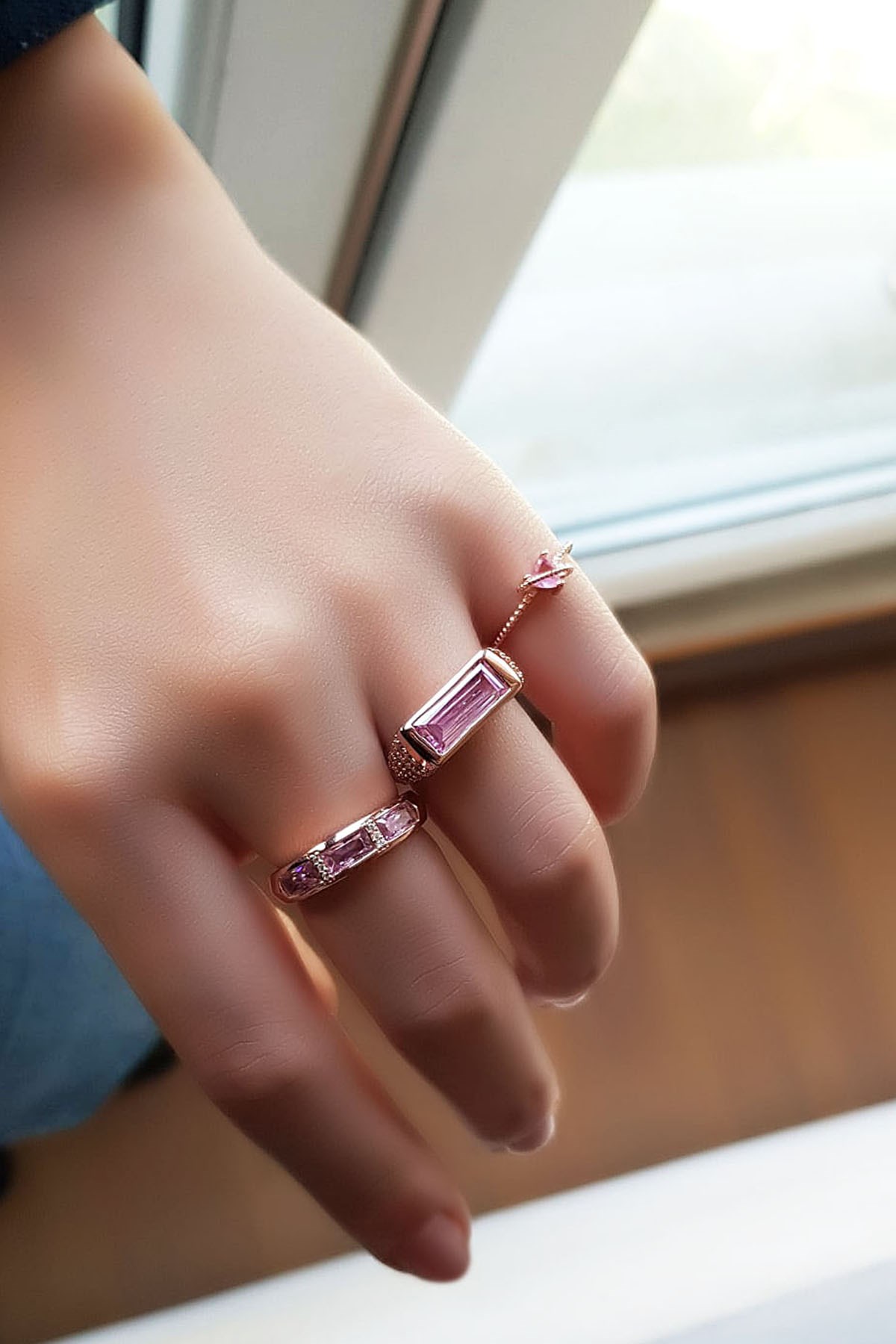 SILVER RING WITH PINK ZIRCON STONES 