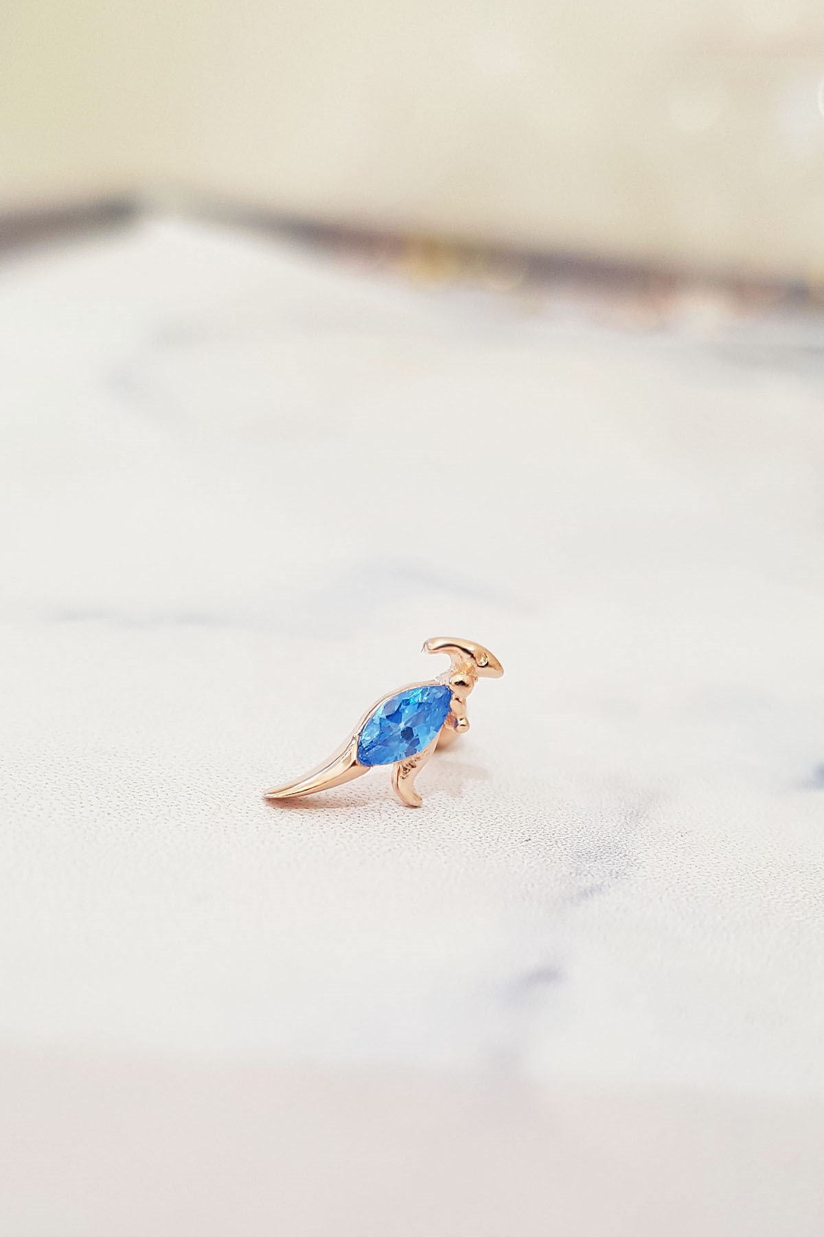 TEKLİ İTHAL MAVİ TAŞLI GÜMÜŞ  PİERCİNG KÜPE