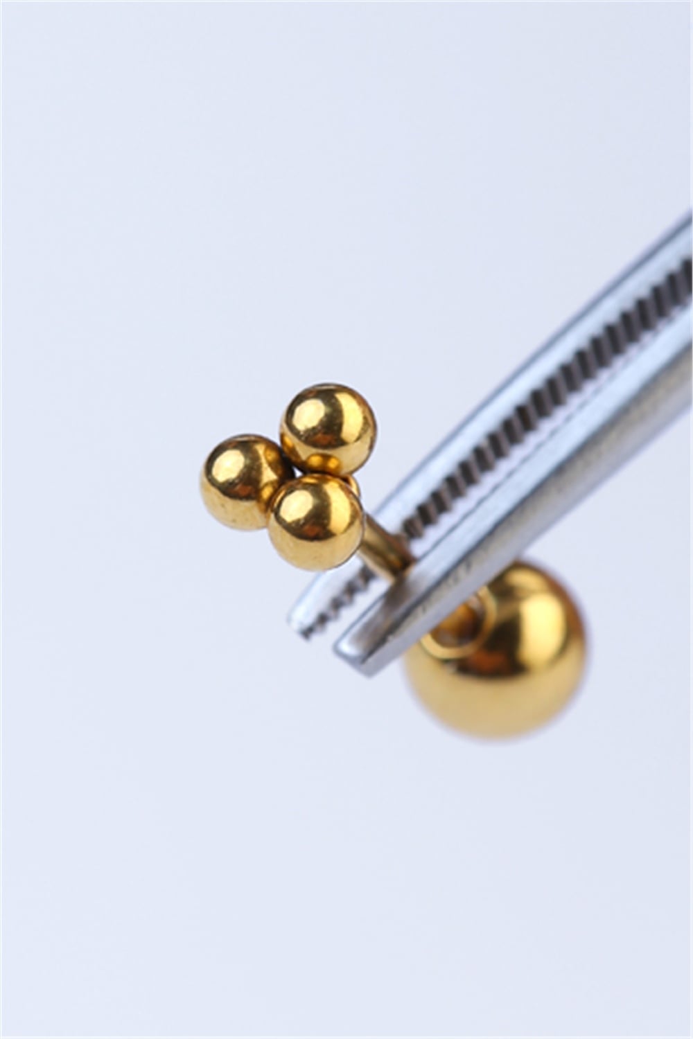 Üç Top Gold Piercing