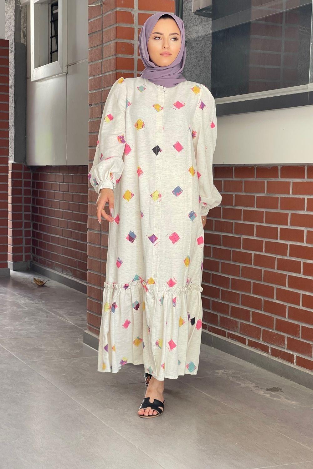 فستان من الكتان منقوش باللون الوردي