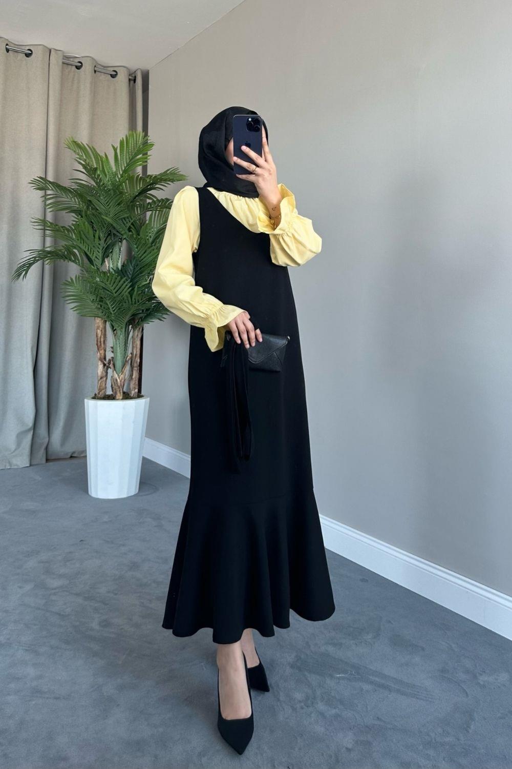 جيليه بدون أكمام باللون الأسود