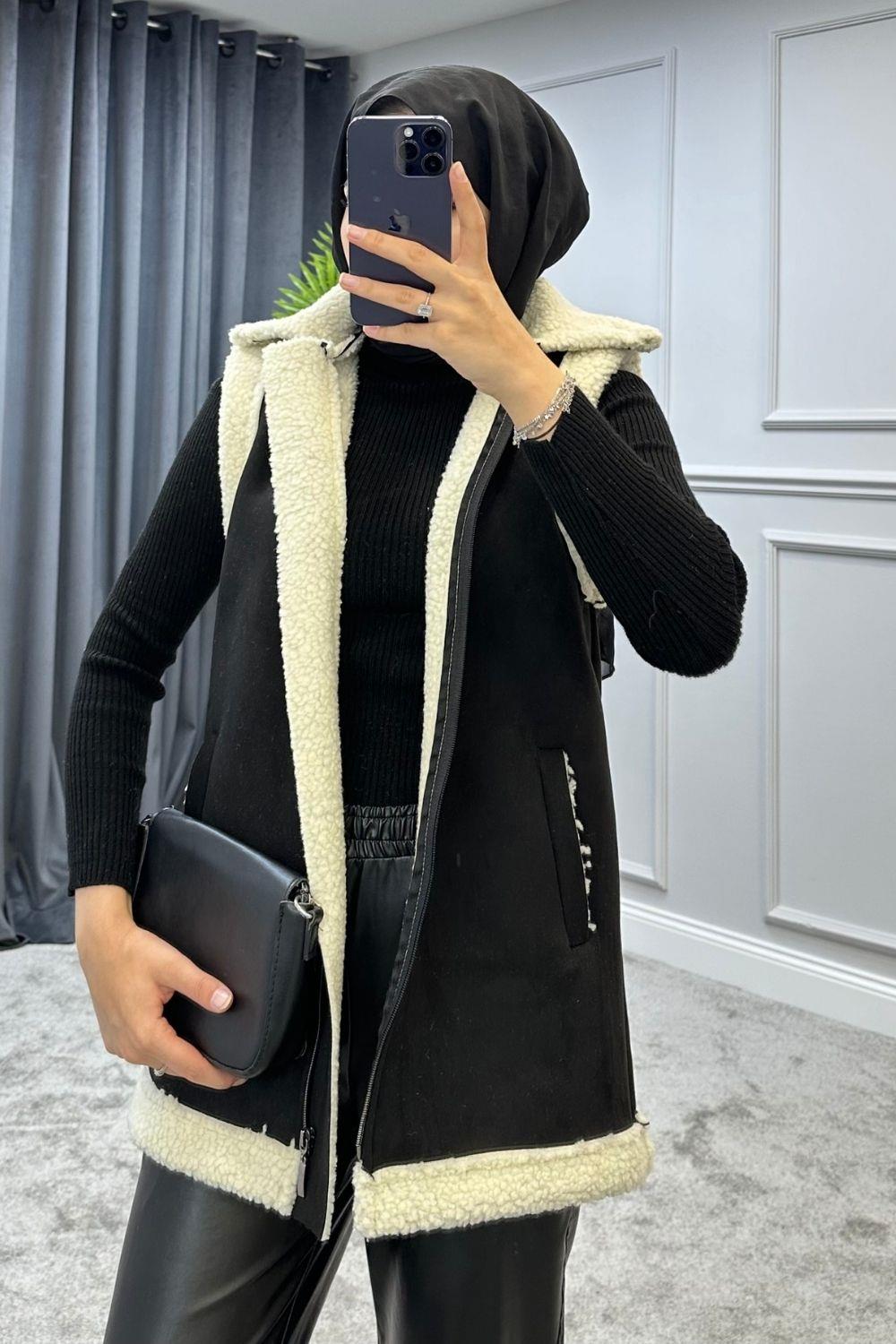 سترة راكب الدراجة النارية باللون الأسود