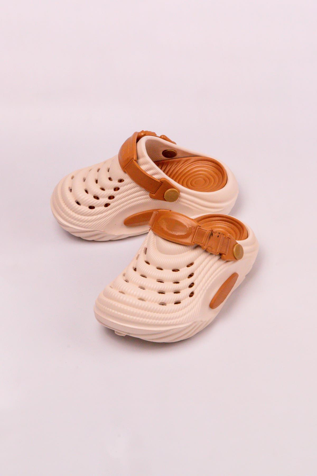 Kapalı Unisex Kaymaz Taban Ekru-Taba Çocuk Terlik 26-35 NumaraAyakkabı & TerlikKapalı Unisex Kaymaz Taban Ekru-Taba Çocuk Terlik 26-35 Numara
