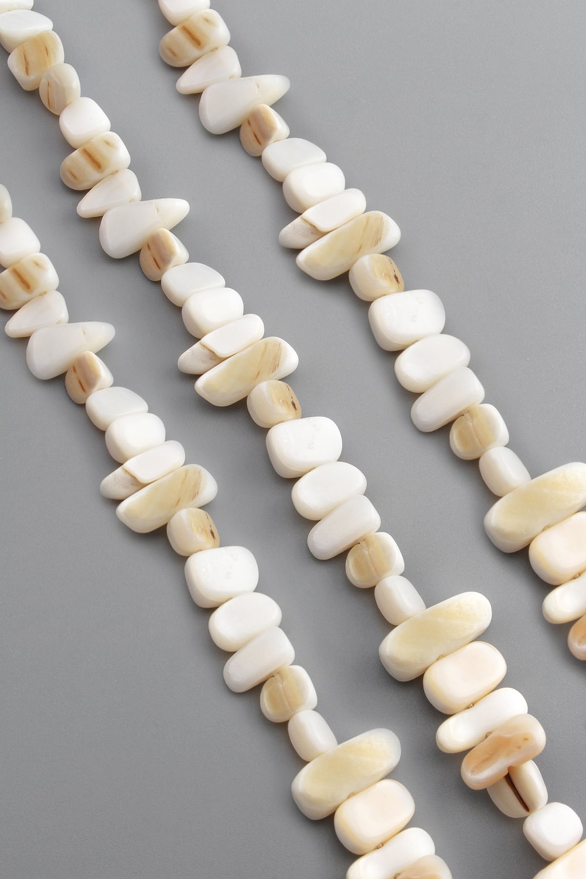 Sedef Taşı Parlak Kırık Beyaz Amorf Kesim 12x7mm Dizi [AA]