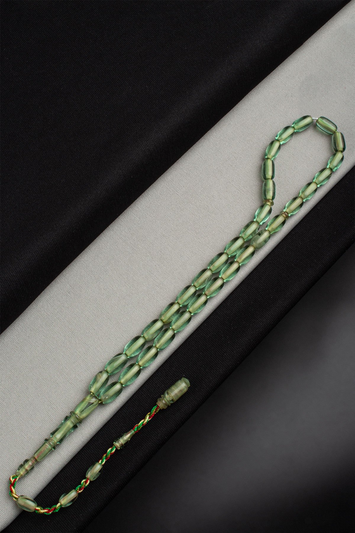 Sıkma Kehribar Su Yeşili Kapsül Kesim 7x12mm 33 Lu Tesbih