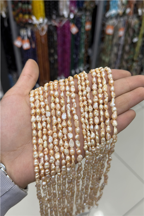 İnci Doğal Taş Pembe Amorf Kesim 6x7mm Dizi
