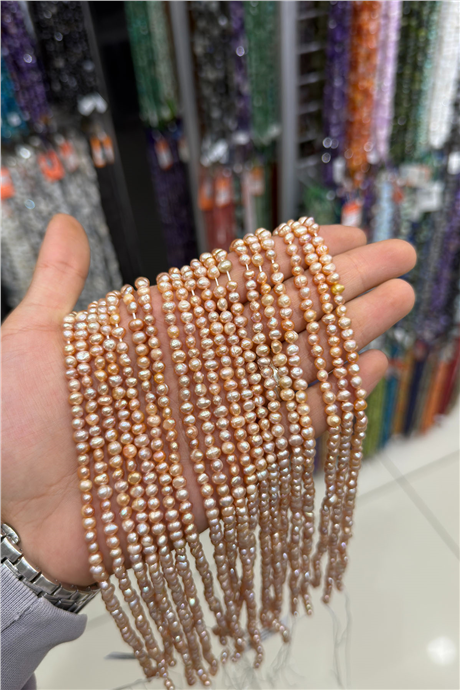 İnci Doğal Taş Pembe Küre Kesim 4x5mm Dizi