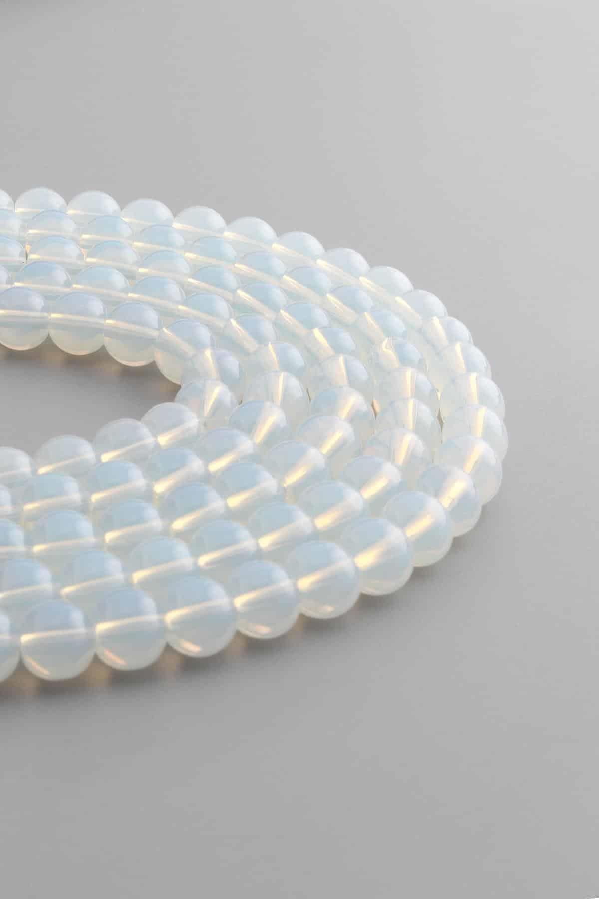 Glass White Globe Cut 8mm String Of Beads