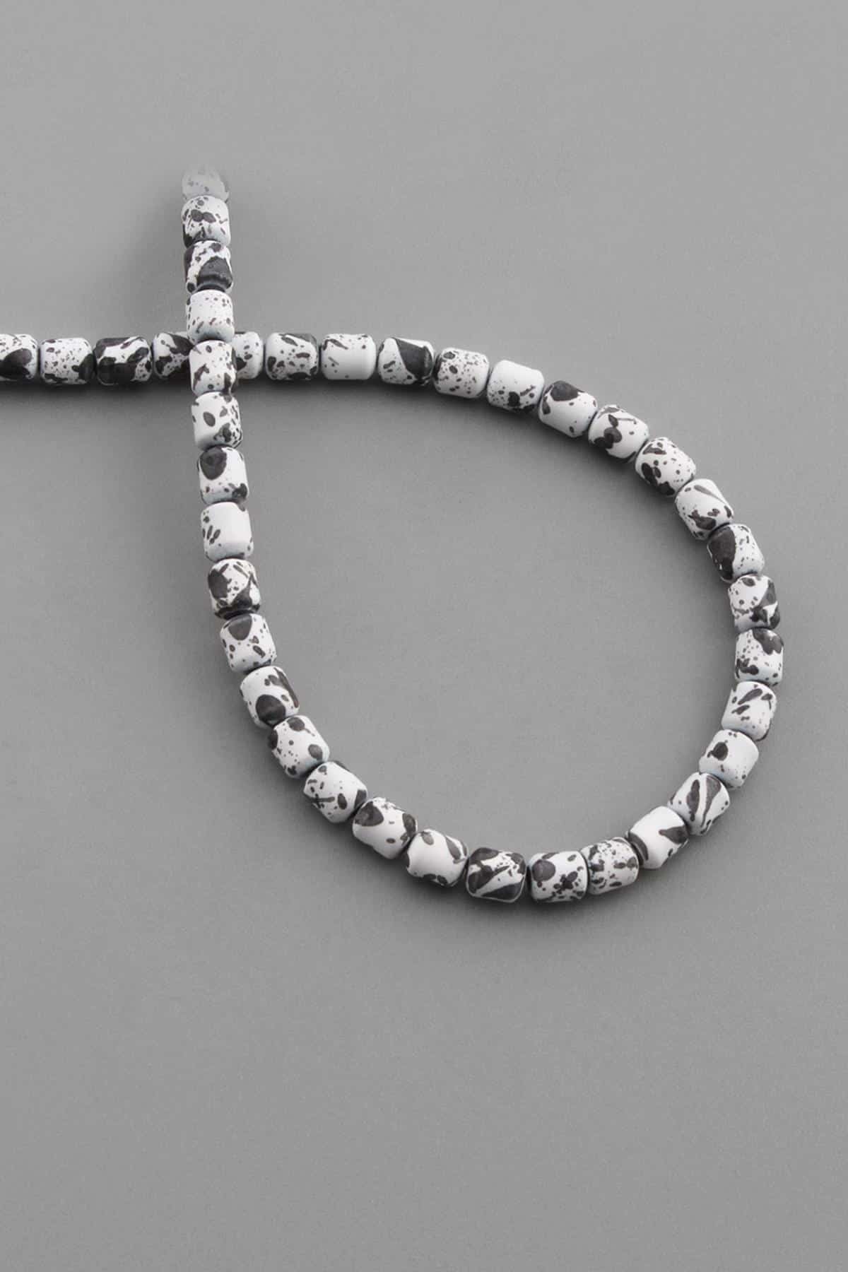 Hematite Natural Stone Matte Mottled White Cylinder Cut 4x5mm String Of Beads