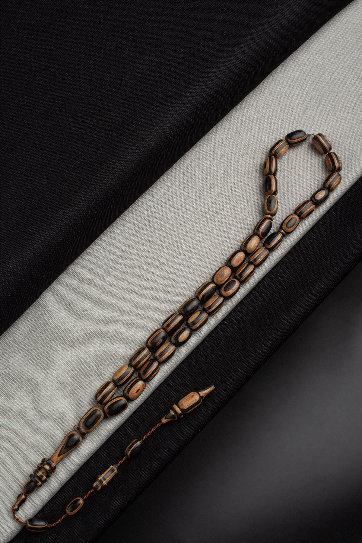 Kafur Ağacı Siyah-Kahverengi Kapsül Kesim 7x10mm 33 Lu Tesbih