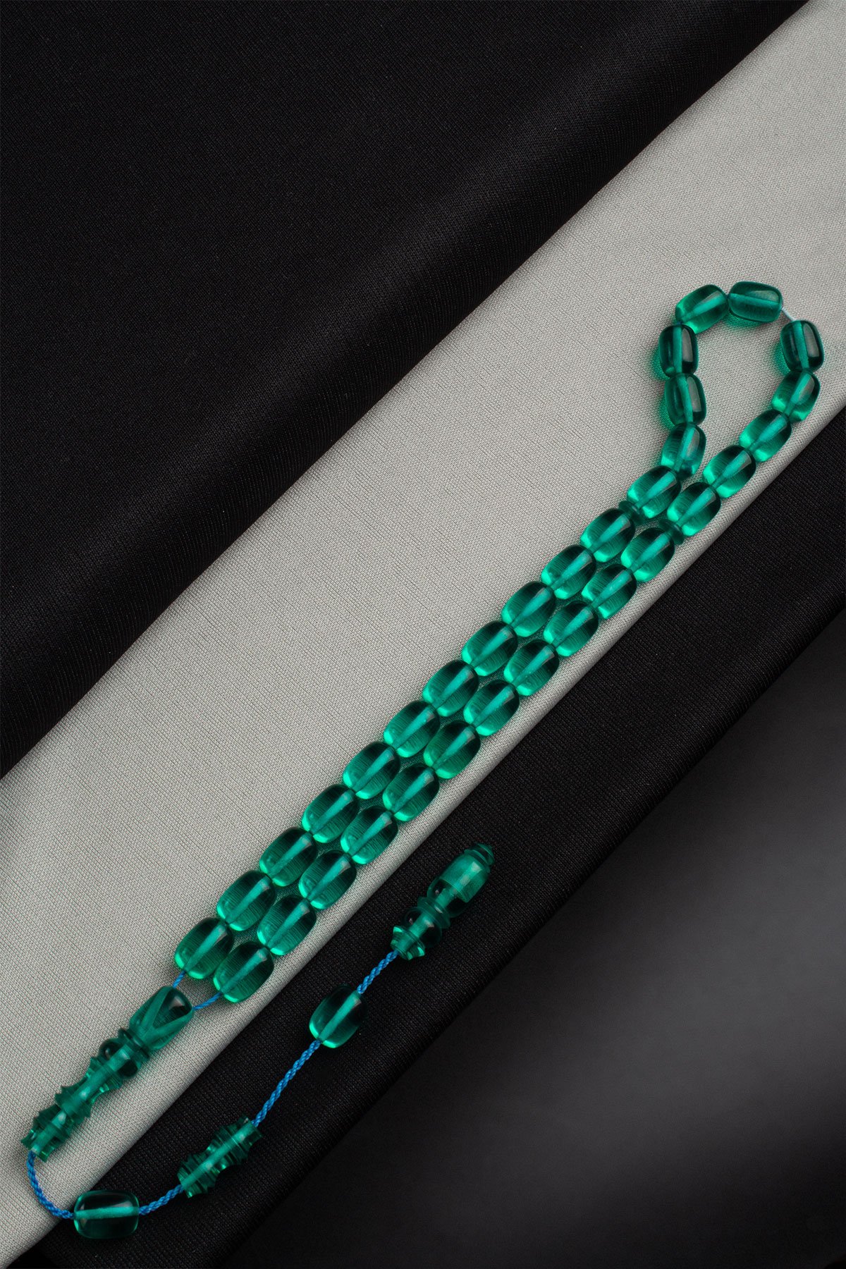 Sıkma Kehribar Mavi Kapsül Kesim 9x12mm 33 Lu Tesbih