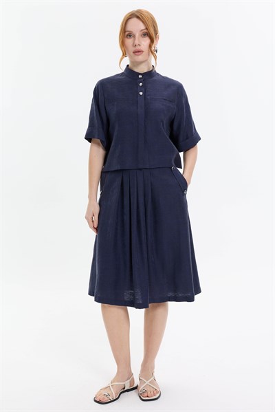 PLİ DETAYLI CEPLİ MİDİ ETEK