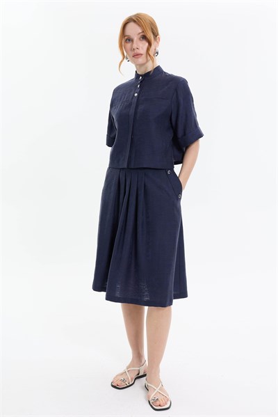 PLİ DETAYLI CEPLİ MİDİ ETEK