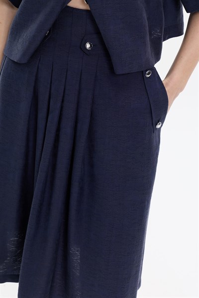 PLİ DETAYLI CEPLİ MİDİ ETEK