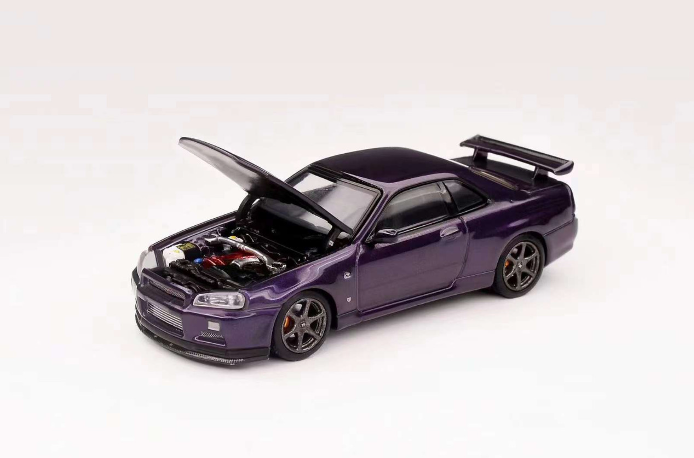 MotorHelix Nissan Skyline GT-R R34 V-Spec II Midnight Purple