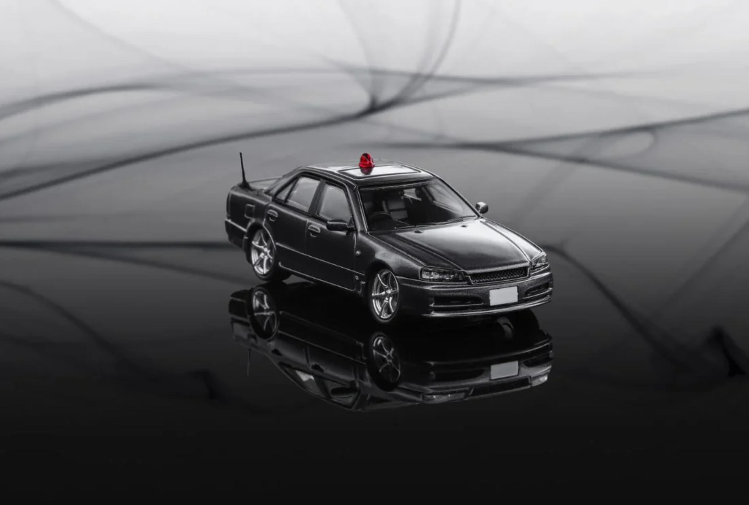 Mortal Nissan Skyline R34 GTT Police Gray