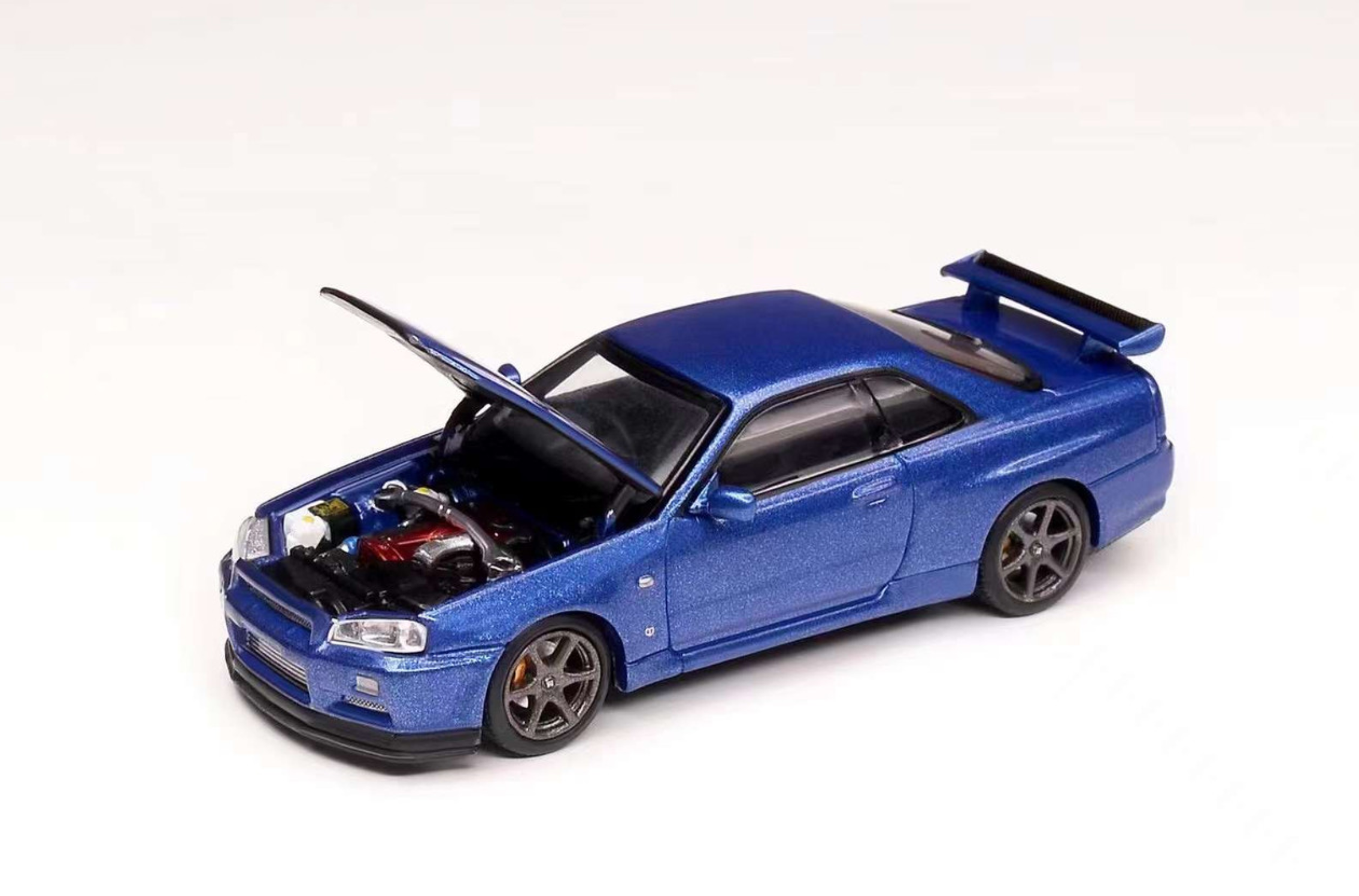 MotorHelix Nissan Skyline GT-R R34 V-Spec II Bayside Blue