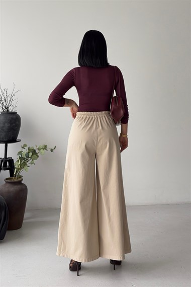 Arkası Lastikli Bol Paça Kot Pantolon 7120