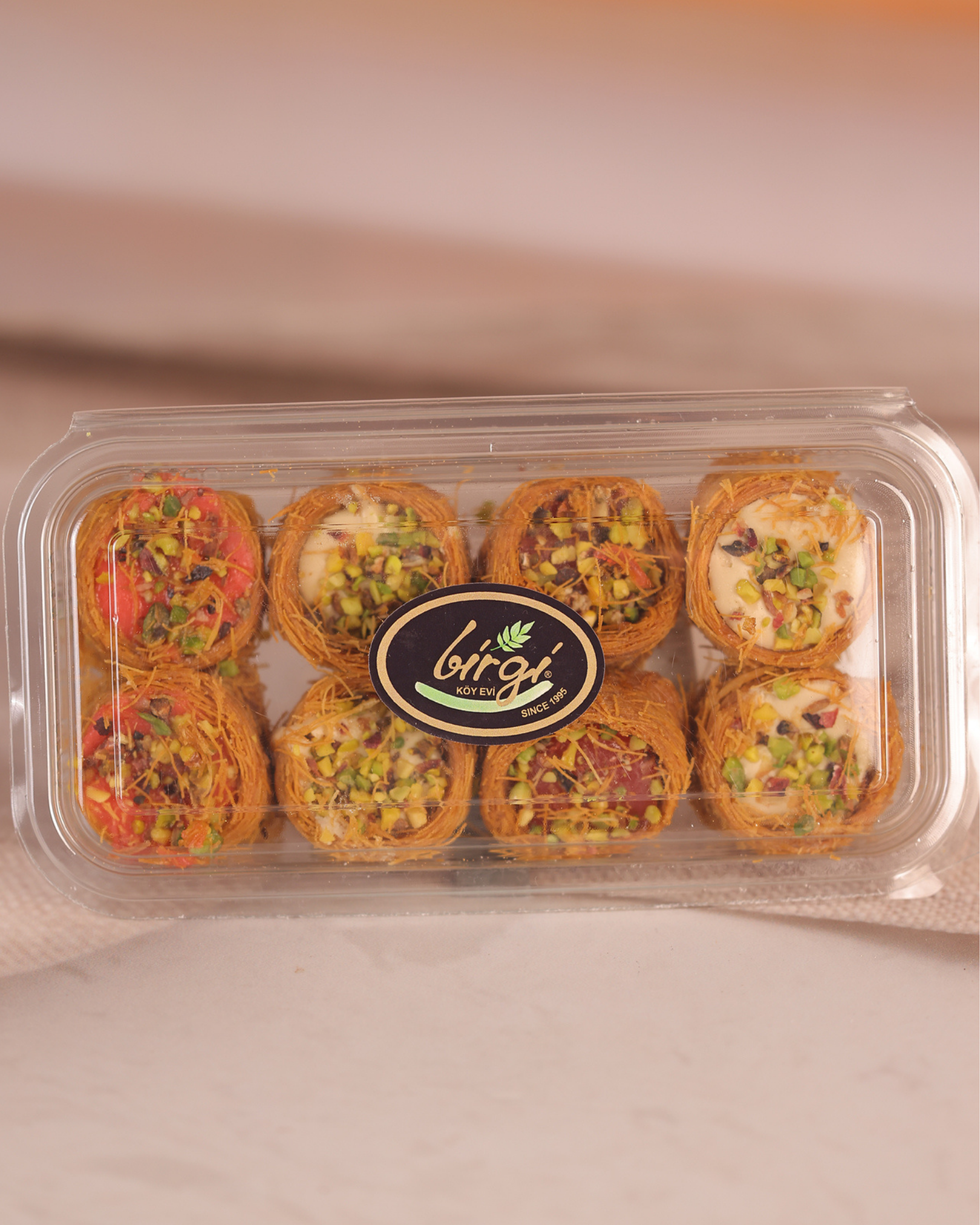 Birgi Köy EviLOKUMLARBirgi Köy Evi Çilekli, Vişneli ve Kaymaklı Karışık Bülbül Yuvası (250 gr)