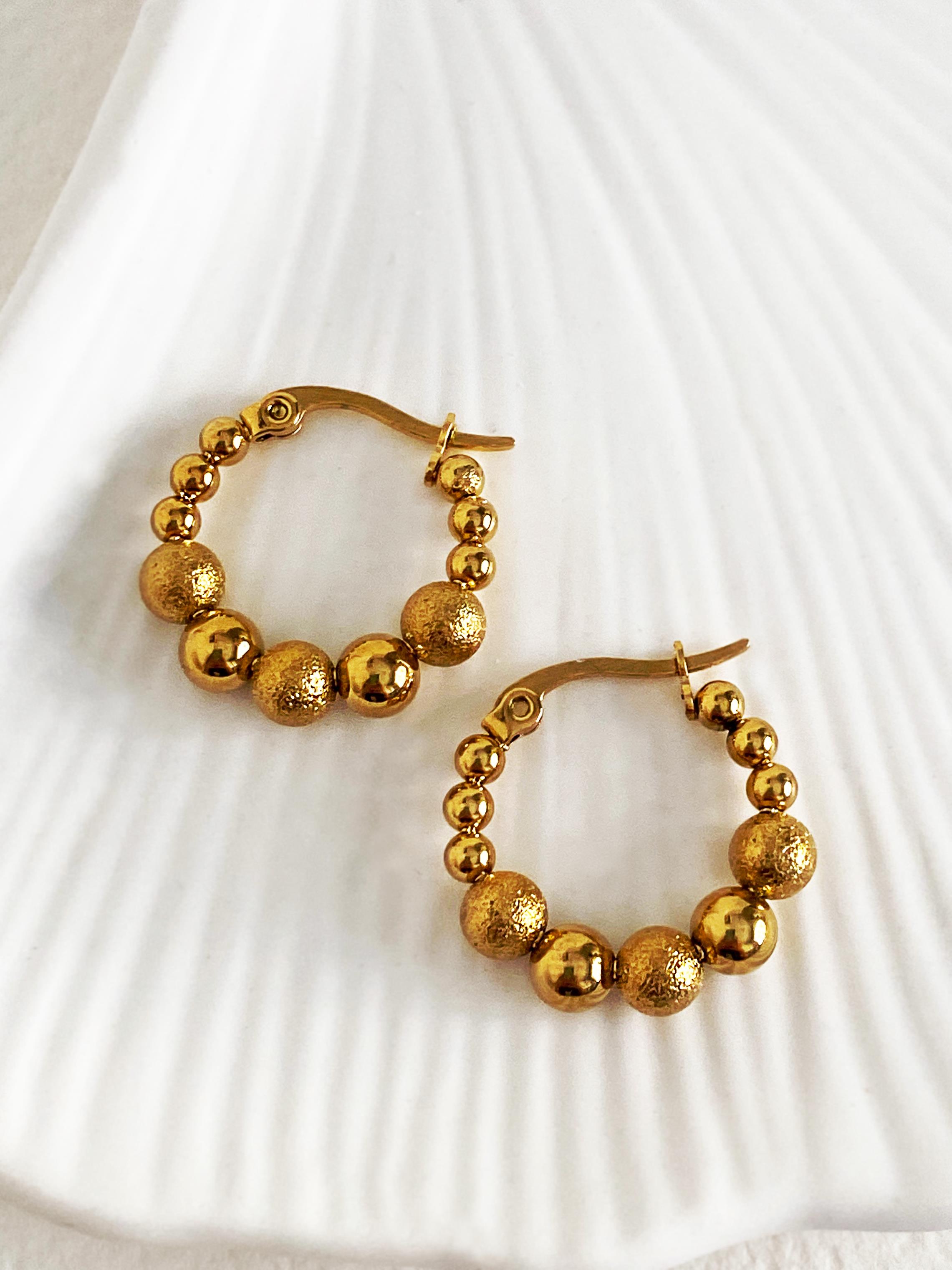 Dorika Boncuklu Çelik Halka Küpe