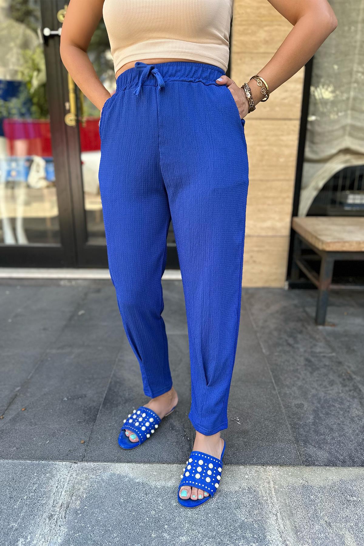 Beli Lastikli Saks Mavi Pantolon