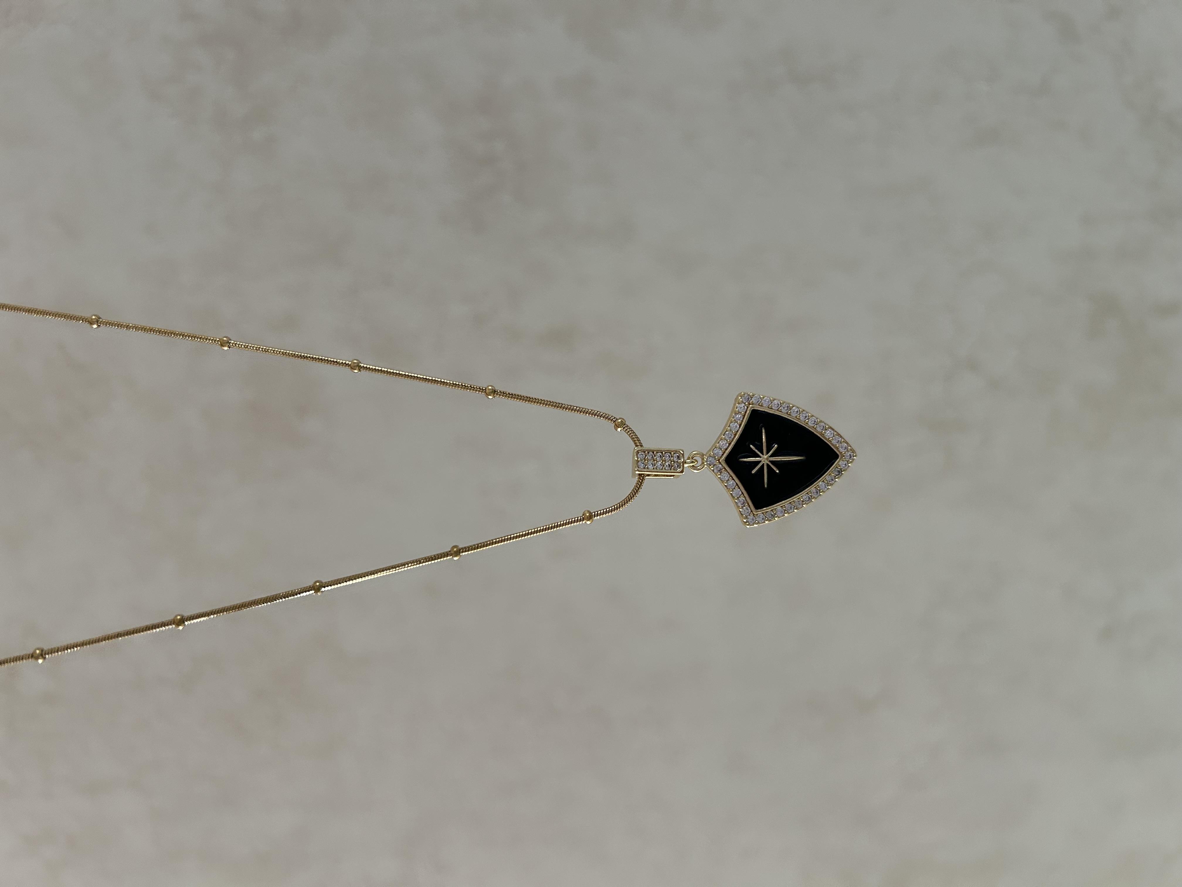 Dorikalı kutup yıldızı kolye 