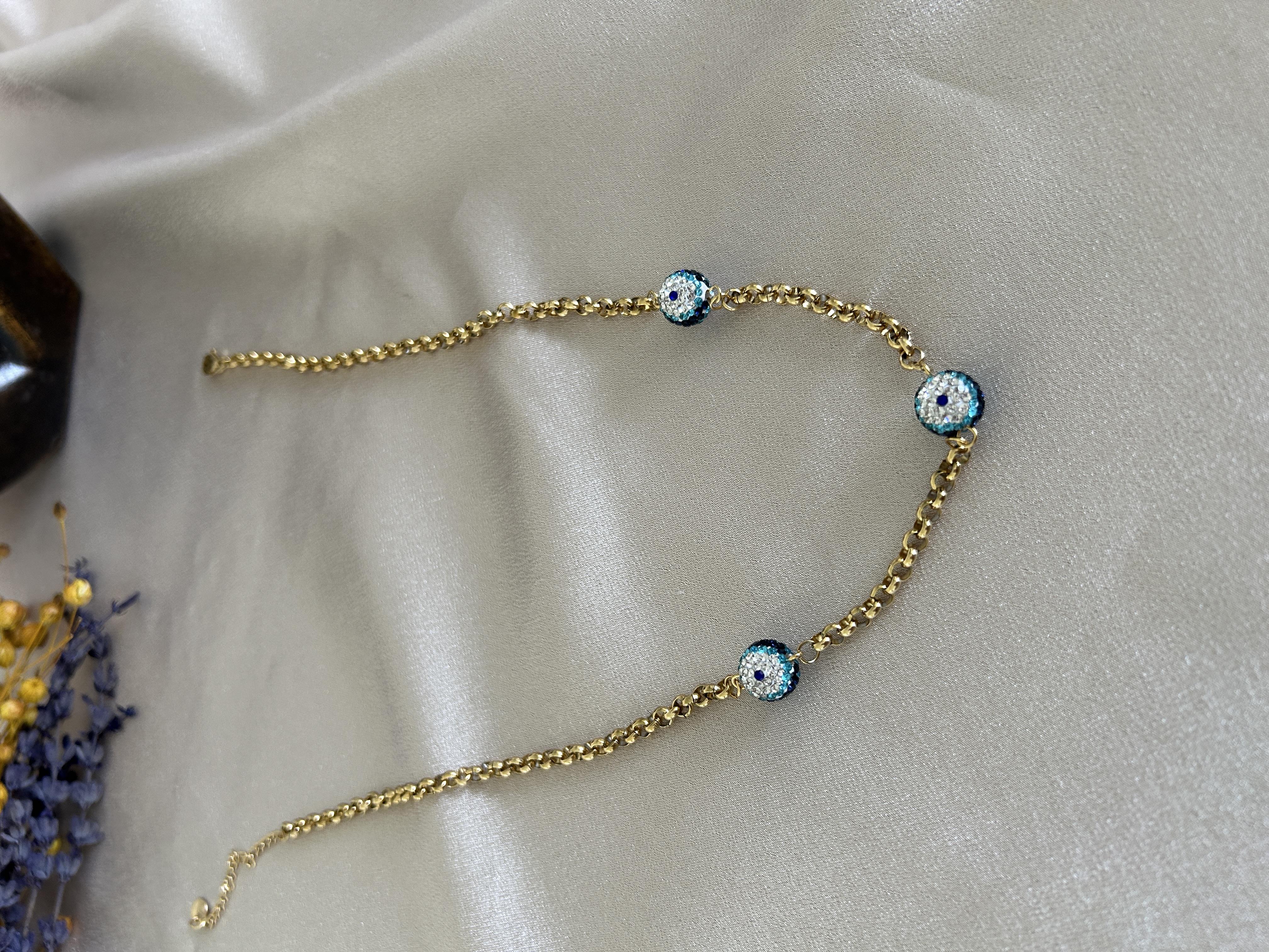 Üç nazar taşlı Çelik kolye 