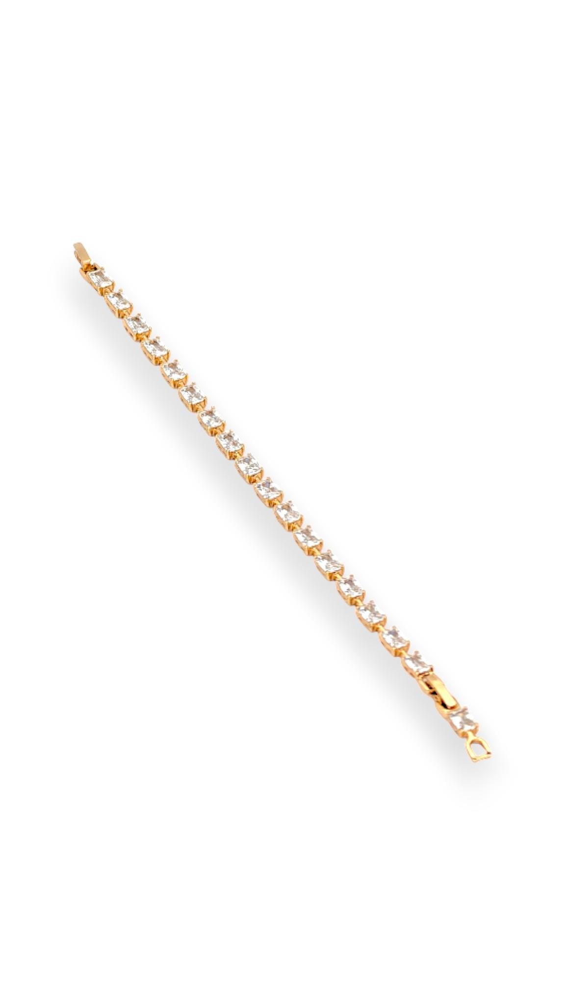Araları açık sıralı taşlı gold 19 cm bileklik