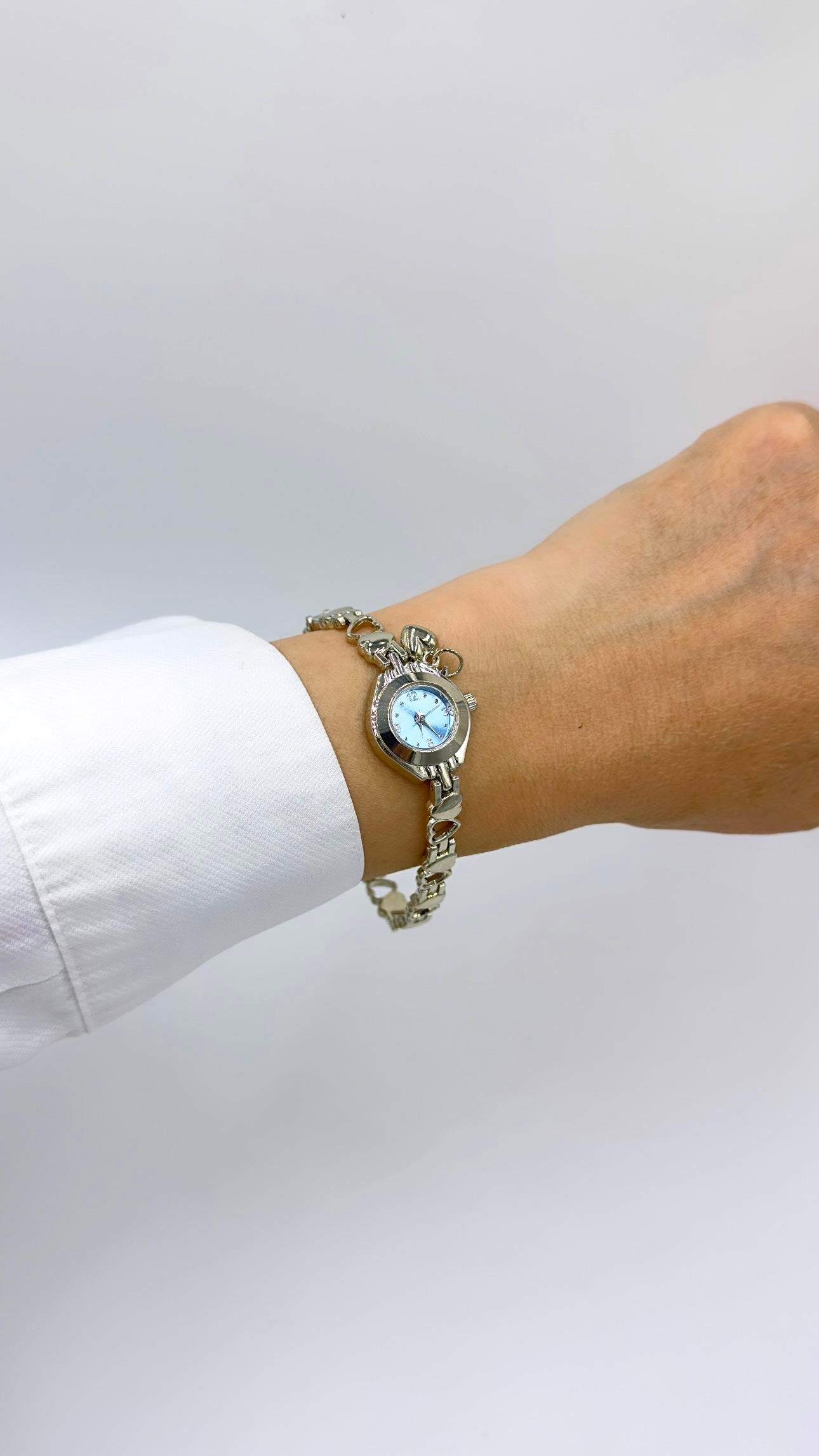 Kalpli Sılver Kordonlu Yuvarlak Mavi Kadranl Charmlıı Saat