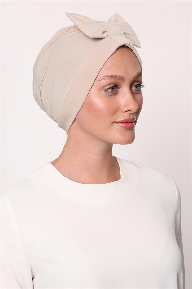 A.Bej Fiyonklu Çapraz Bone