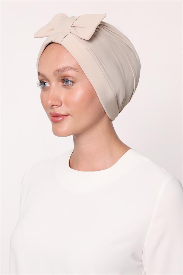 A.Bej Fiyonklu Çapraz Bone