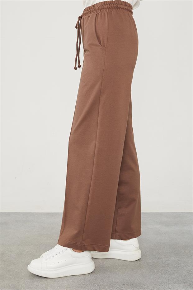 Toprak Beli Lastikli Kuşgözü Detaylı Pantolon