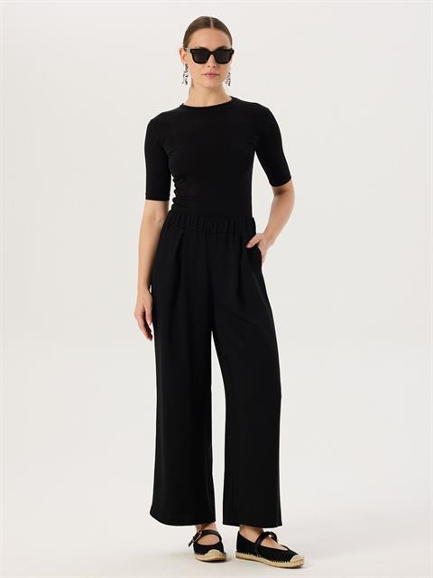 Beli Lastikli Dökümlü Bol Paça Pantolon - Siyah