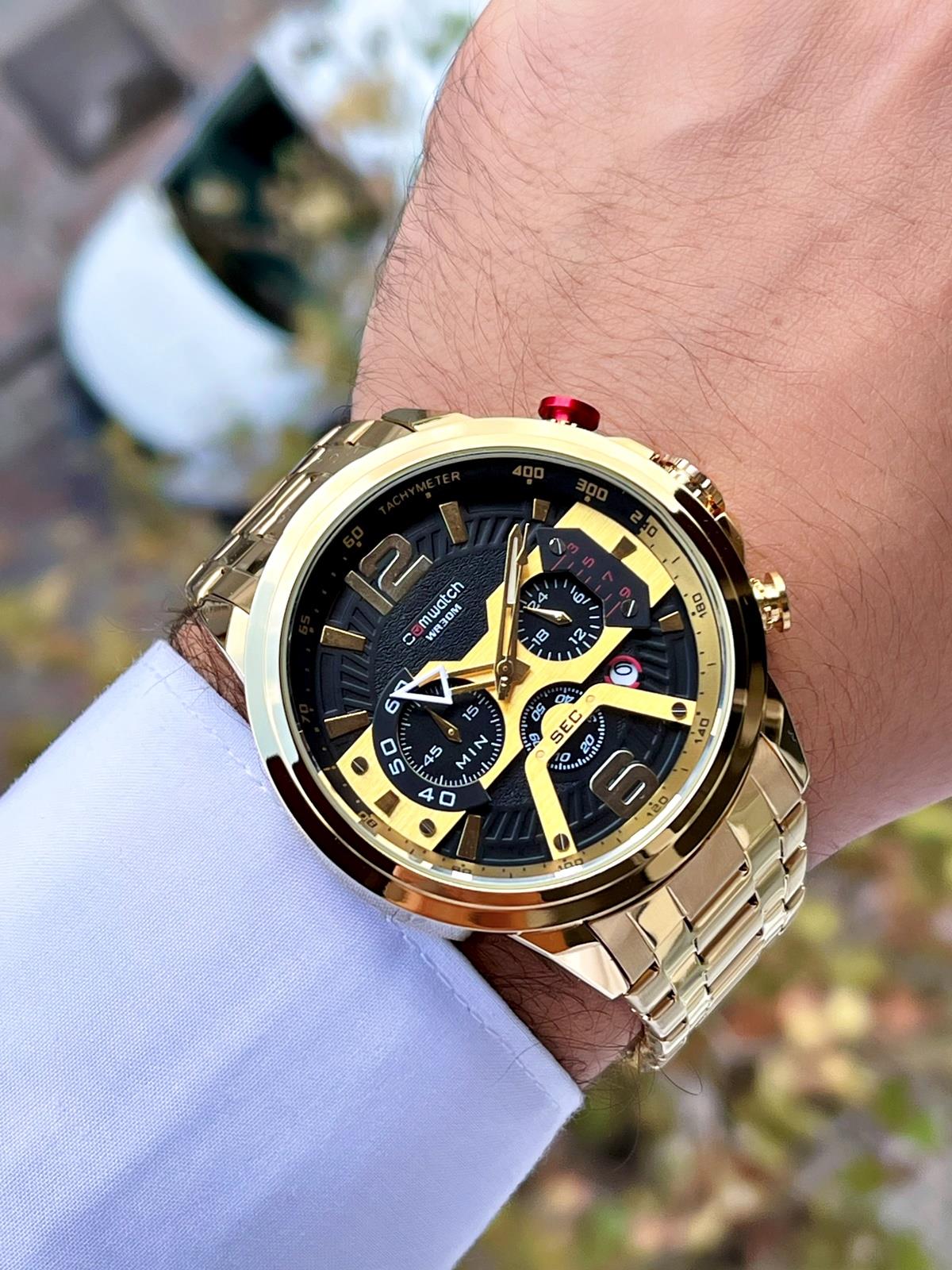 Comwatch Çelik Kordon Kronometre ve Takvimli Gold ve Siyah Renk Erkek Klasik Kol Saati 3007-GGBG