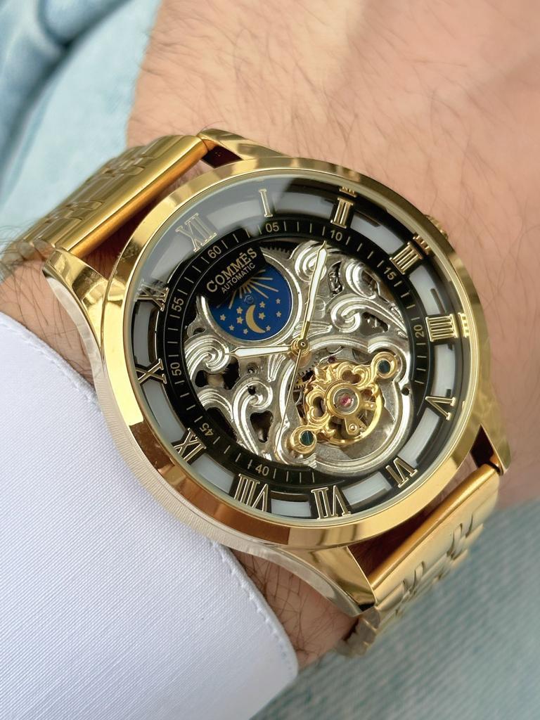 Commes Otomatik Şarj Mekanizmalı Çelik Kordon Altın Siyah Renk Erkek Klasik Kol Saati 8152C-GGB