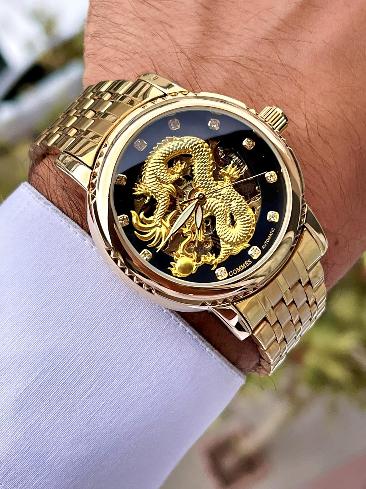 Commes Otomatik Şarj Mekanizmalı Çelik Altın Siyah Renk Ejderha Motifli Erkek Kol Saati 7022-GGB