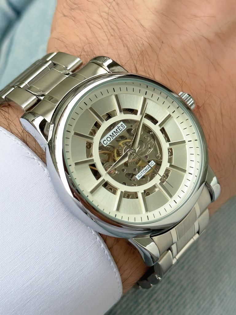 Commes Otomatik Şarj Mekanizmalı Çelik Kordon Gümüş Beyaz Renk Erkek Klasik Kol Saati 8153C-SSW