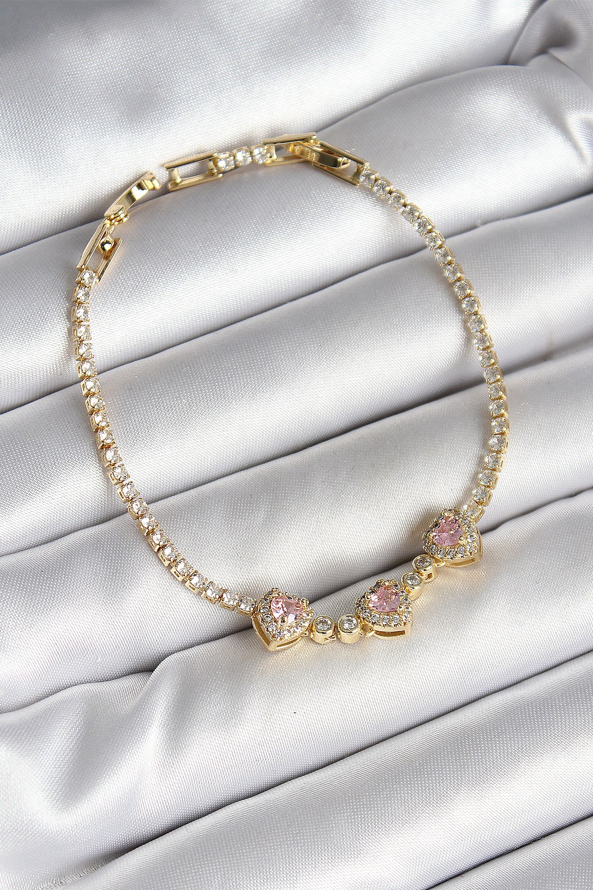 Pirinç Sıralı Pembe Kalp Figürlü Zirkon Taşlı Gold Renk Kadın Bileklik